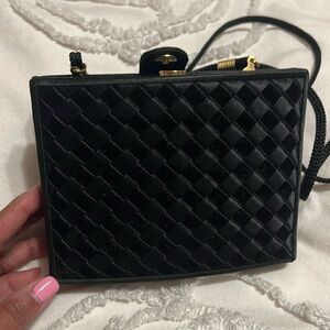 Small black satin purse.